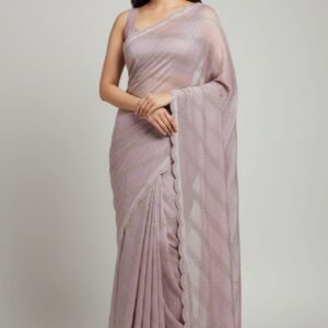 Fandy crush fabric with heavy jarkan work in full saree and heavy blouse